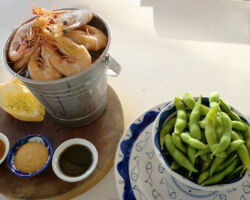 Sailing Club snack (steamed prawns with 3 dipping sauces and edamame). Kep, Cambodia