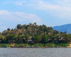 View of Luang Prabang from our boat ride on the Mekong river. Luang Prabang, Laos.