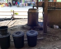 Sticky rice whiskey stills made at a small village just outside of town. Luang Prabang, Laos.