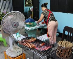 Local sausage vendor. Luang Prabang, Laos.