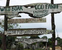 Sign at the road to the "Pub with Cold Beer". The 2 Km out there were very muddy. Phong Nha, Vietnam.