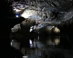Boat ride inside Phong Nha cave. Phong Nha, Vietnam.