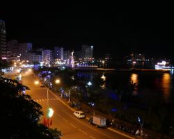 Cat Ba Town nighttime view of the main street. Cat Ba Island, Vietnam.