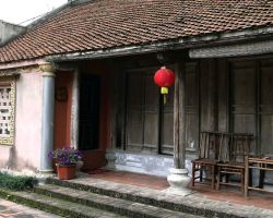 Vietnamese Ancient Village (also our accommodation). Inside was tastefully refurbished with huge murals on the high ceiling depicting traditional Vietnamese life. Tam Coc, Vietnam.