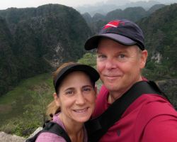 Rick and Alisa at the Hang Mua viewpoint summit (500+ stone steps to the top). Tam Coc, Vietnam.