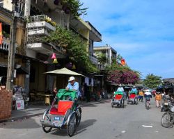 Bicycle taxis. Tons of these guys all over trying to get you to go for a tour around town. Chinese tourists seem to love them. Hoi An, Vietnam.