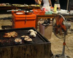 The next order of seafood on the barbecue. Phu Quoc, Vietnam.