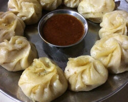 Closer view of spinach and cheese momos, a Nepali specialty. These are delicious especially with the spicy dipping sauce. Kathmandu, Nepal.