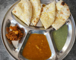 TG's naan bread with curry and mint sauce. Kuala Lumpur, Malaysia.