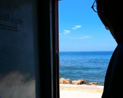 Alisa's view during the 2-1/2 hour train ride from Colombo to Galle. Galle Fort, Sri Lanka.