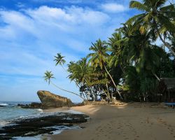 Dalawella beach and our guesthouse at sunrise. Dalawella, Sri Lanka.
