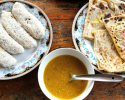 Another Sri Lankan breakfast. Roti with egg and dahl curry and string pancakes. The string pancakes are filled with coconut and sugar. Polonnaruwa, Sri Lanka.