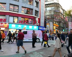 Ximending District street scene at dusk. Greater Taipei, Taiwan.