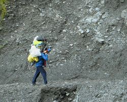 The porter, also part of our group, on the Nanggao trail. Western Area, Taiwan.