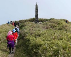Our group arriving at the "East Meets West" Monument (this ridge is the dividing line between the East and West). Western Area, Taiwan.