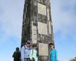 Rick, Alisa, and JingTing in front of the "East Meets West" Monument. Western Area, Taiwan.