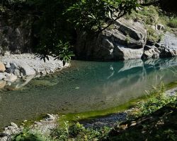 River with reflection along the Shakadang Trail in Taroko Gorge. East Coast, Taiwan.