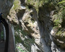 Rick taking video at the edge of one of the walkways at Swallow Grotto Taroko Gorge. East Coast, Taiwan.
