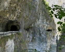 Tunnel road carved in the rock wall at Swallow Grotto in Taroko Gorge. East Coast, Taiwan.