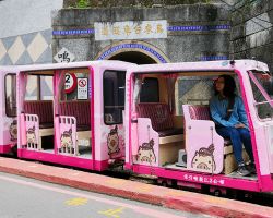 Wulai Log Cart. The carts run 1 mile from town to a cable car and waterfall. Northern Area, Taiwan.